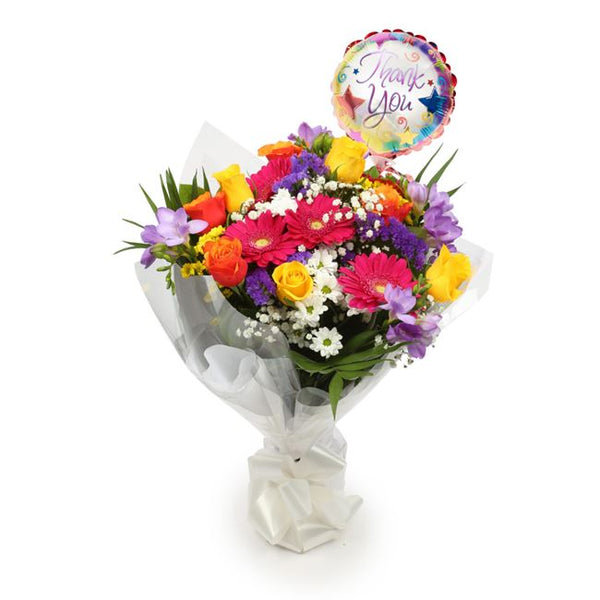 Thank You Balloon & Brilliant Blooms BouquetThis Beautiful Bouquet, carefully selected flowers with foliage are expertly arranged to create this dramatic design. This stunning gift is the ultimate gift to create an impression. Beautifully wrapped and tied